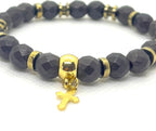 Bracelet hématite bronze porté au poignet