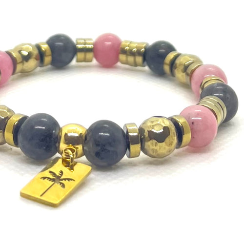 Bracelet quartz rose et labradorite porté au poignet