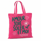 Tote bag Amour Joie Soleil et Moi : détail du lettrage vert et des motifs joyeux